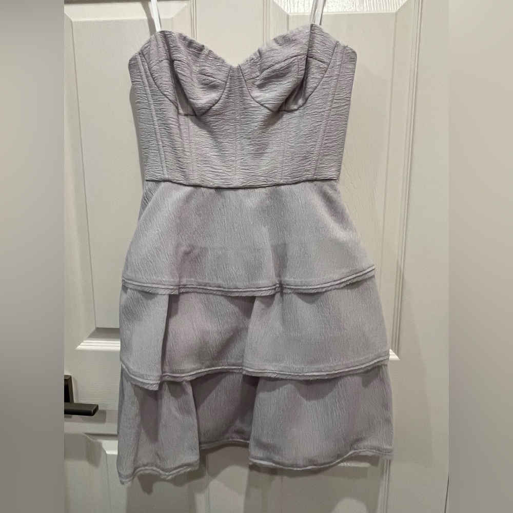 BCBG size 4. Frosty white in color.